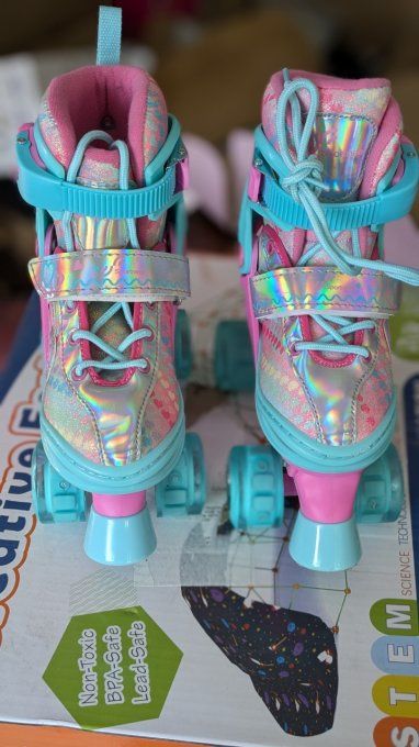  Patins à roulettes pour Enfants .Taille 30-33 Excellente état.